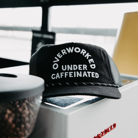 Overworked Under Caffeinated Hat